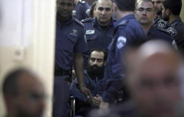 Samer Essawi after being sentenced, February 21, 2013.