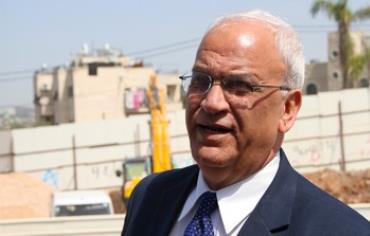 Palestinian negotiator Saeb Erekat at construction site for Route 4, March 14, 2013.