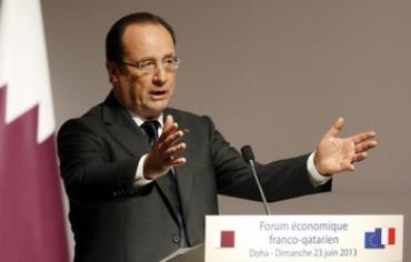 Hollande speaks during the opening of the Qatari-French Business Forum in Doha June 23, 2013. 