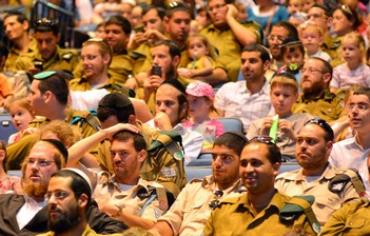 Haredi soldiers and their families attend event honoring them in Haifa, July 22, 2013.