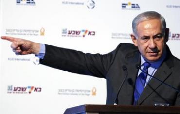 Israel's Prime Minister Benjamin Netanyahu gestures during his speech