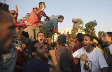 Brotherhood supporters protest outside  El-Thadiya presidential palace in Cairo September 20, 2013.