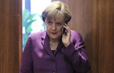 Germany's Chancellor Angela Merkel uses her mobile phone [file].