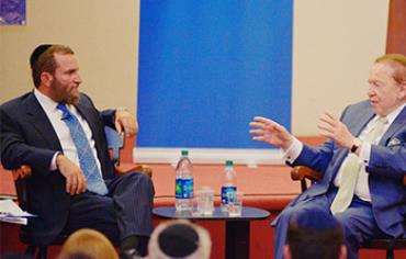 Rabbi Shmuley Boteach and Sheldon Adelson at a Yeshiva University debate, October 22, 2013.  