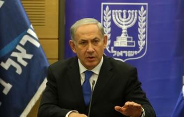 PM Binyamin Netanyahu speaks to reporters at the start of the Likud faction meeting in the Knesset.