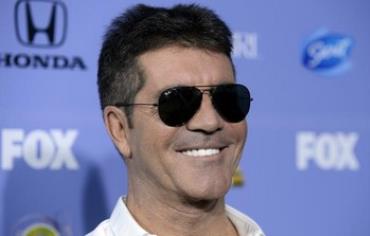 Simon Cowell attends the premiere of X Factor in West Hollywood, California September 5, 2013.