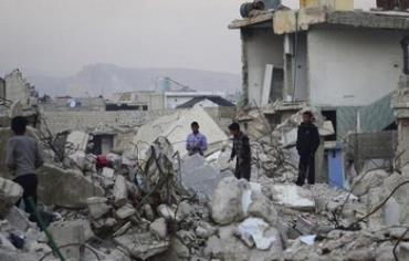 Syrian children survey damage in Damascus