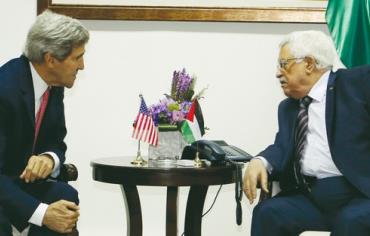 US Secretary of State John Kerry meets with Palestinian President Mahmoud Abbas.