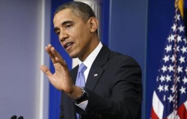 US President Barack Obama gestures during news conference