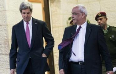 US Secretary of State John Kerry and chief PLO negotiator Saeb Erekat speaking to reporters in Ramal