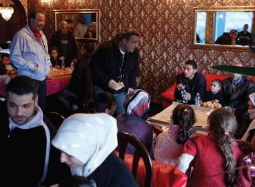 Yank Barry (left standing) with Syrian refugees in Bulgaria.