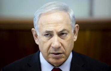 Benjamin Netanyahu attends the weekly cabinet meeting at his office in Jerusalem March 23, 2014. 