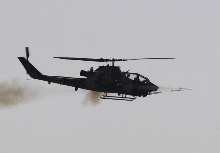 A combat Cobra helicopter fires during the EFES-2010 military exercise in Izmir 