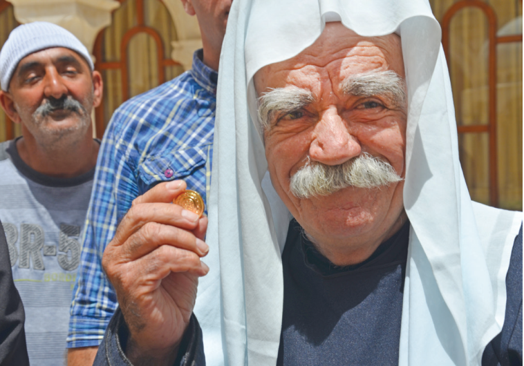 DRUSE SPIRITUAL LEADER Sheikh Muafek Tarif attends the ceremony honoring the divers on Monday.