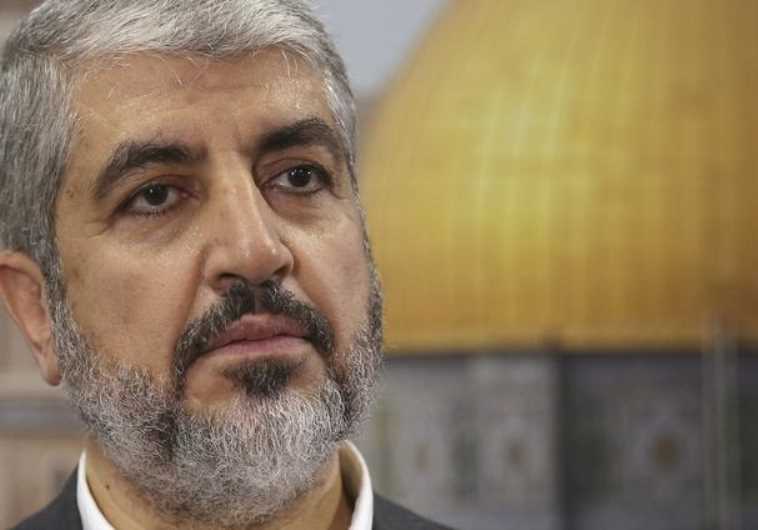 Hamas leader Khaled Mashaal speaks during an interview with Reuters in Doha