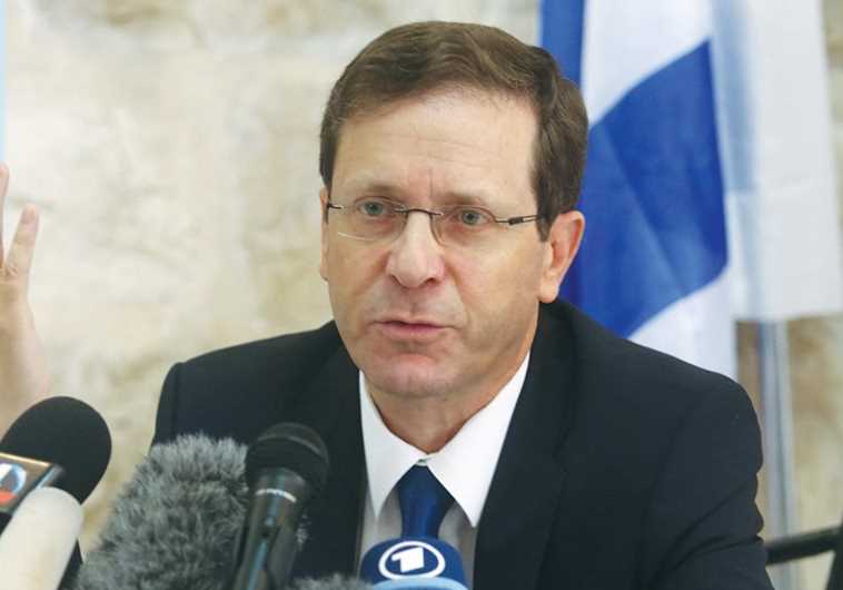 Zionist Union head Isaac Herzog speaks to the press