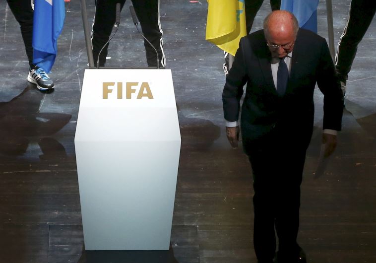 FIFA President Sepp Blatter leaves the stage after making a speech 