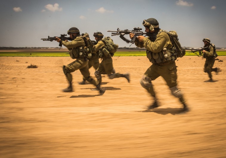 IDF soldiers storm a target during the ground incursion into Gaza