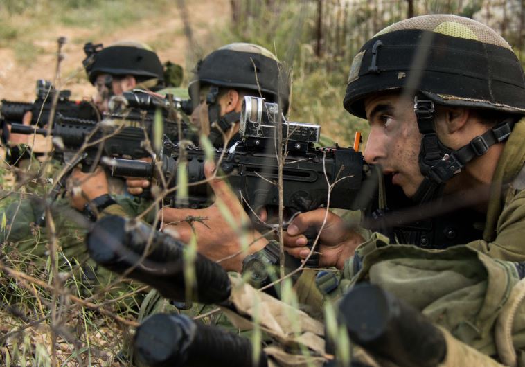 Soldiers with the IDF's Nahal reconnaissance battalion participate in drills