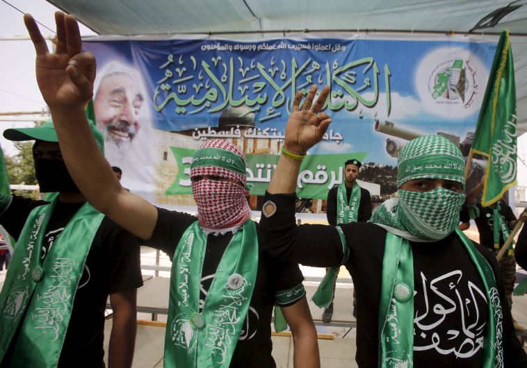 Palestinian students supporting Hamas demonstrate in the West Bank city of Hebron