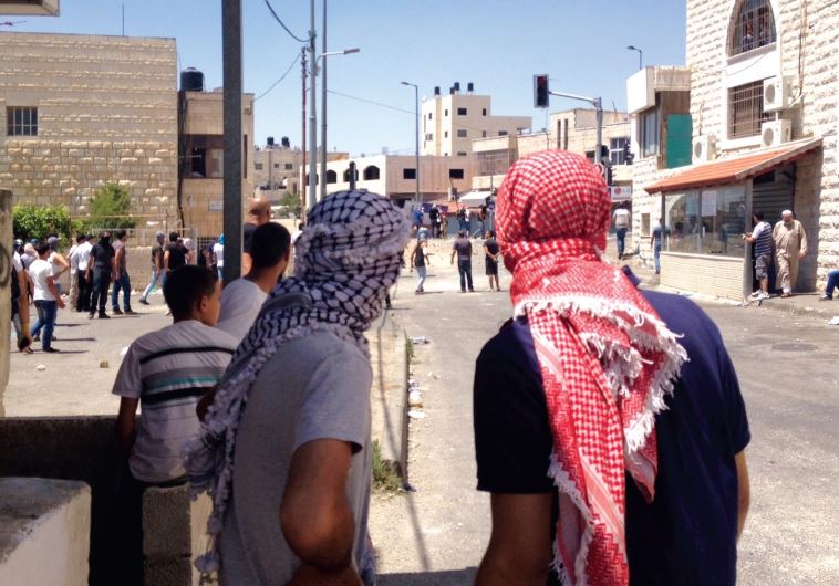 Jewish, Arab views clash a year into terrorist wave