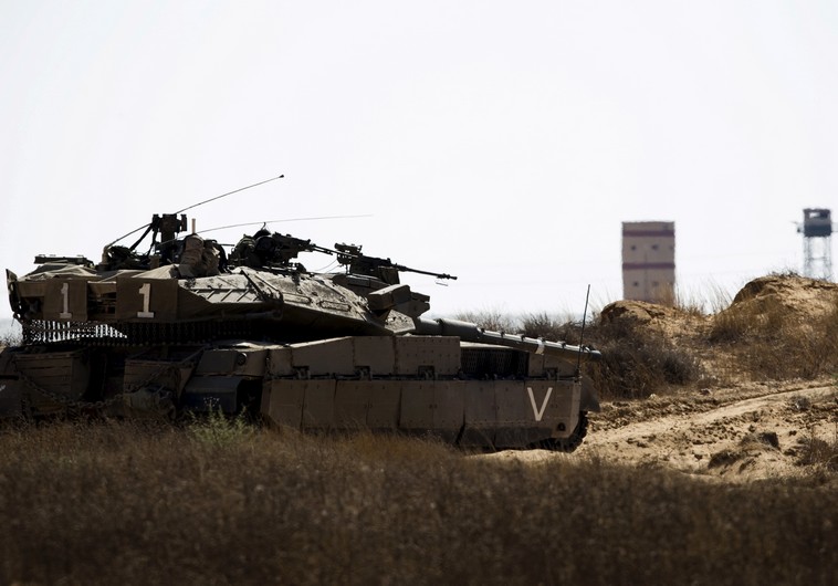 An IDF tank takes position along Israel's border with Egypt's North Sinai