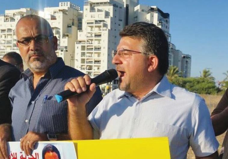 JOINT LIST MK Yousef Jabareen shouts during a protest on Wednesday alongside fellow MK Osama Saadi (