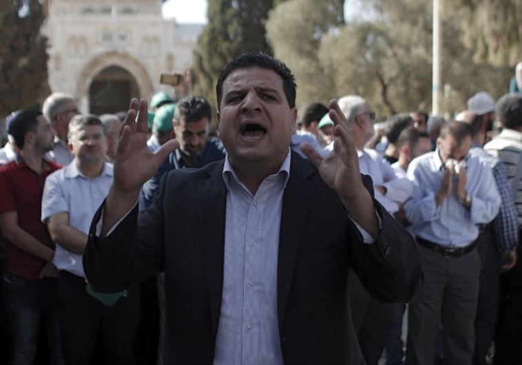 Joint List head Ayman Odeh shouts slogans near the Dome of the Rock in Jerusalem