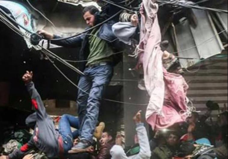 Palestinians in Gaza during a roof collapse