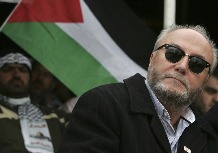 Former British MP George Galloway prepares to speak to the Islamic Action Front supporters in Amman
