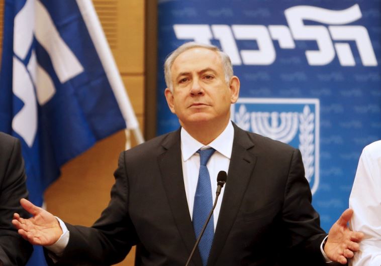 Prime Minister Benjamin Netanyahu (C) attends a meeting of the Likud party