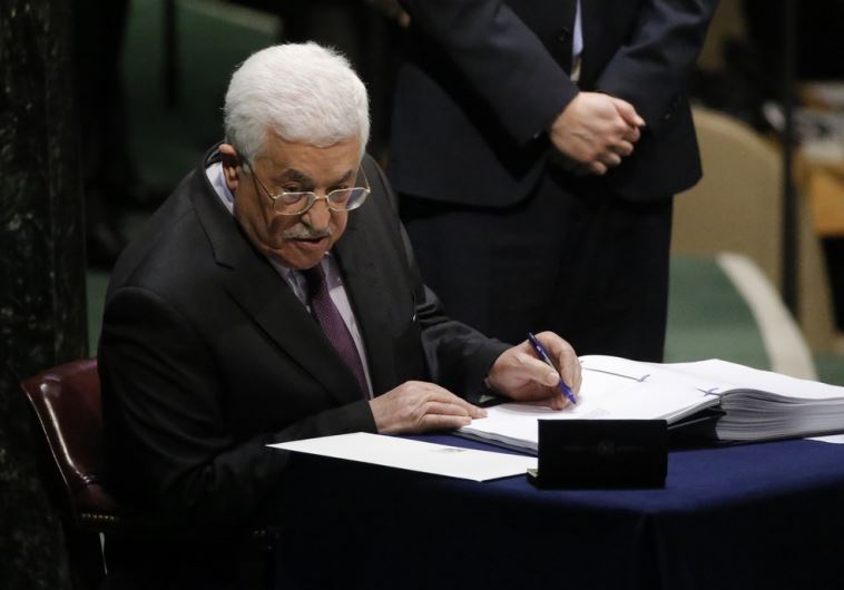 Palestinian Authority President Mahmoud Abbas signs the Paris Agreement on climate change