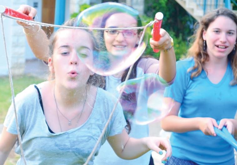 CAMPERS AT Camp Koby enjoy a bubble-making workshop recently at their home base in Kibbutz Yehiam