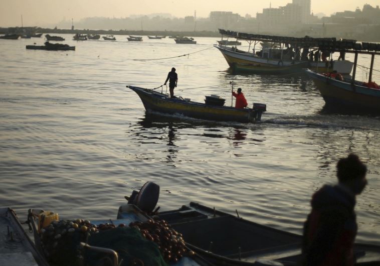 Palestinian fishermen in the waters off of the Gaza Strip