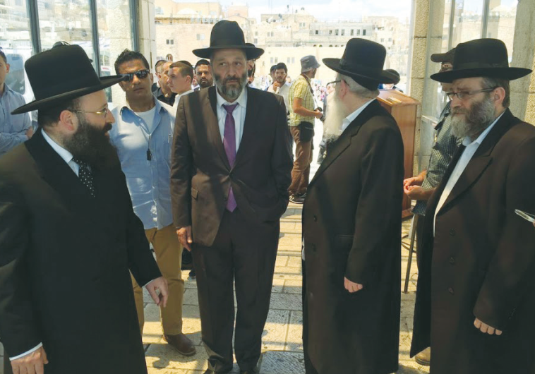 VISITING THE KOTEL Monday are, from left, Rabbi of the Western Wall Shmuel Rabinowitz, Interior Mini