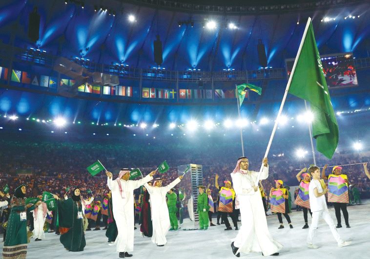 THE SAUDI ARABIAN delegation arrives at the Olympic opening ceremony in Brazil.
