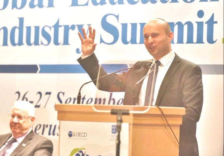 EDUCATION MINISTER Naftali Bennett speaks at the OECD global summit in Jerusalem yesterday as Presid
