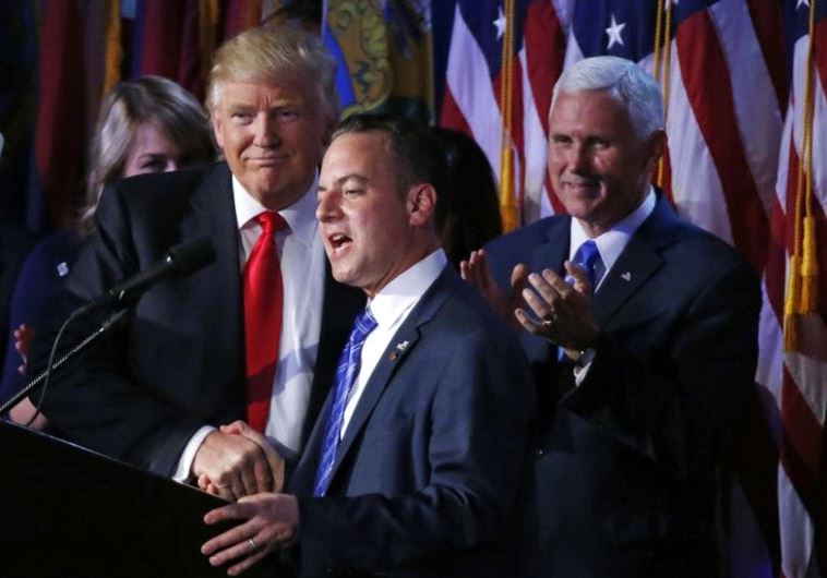 US President elect Donald Trump shakes hands with Republican National Committee Chairman Reince Pr