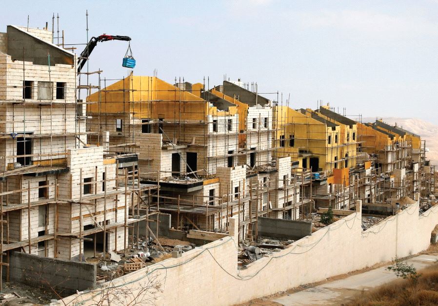 BULIDINGS ARE SEEN last month under construction in the settlement of Ma'aleh Adumim