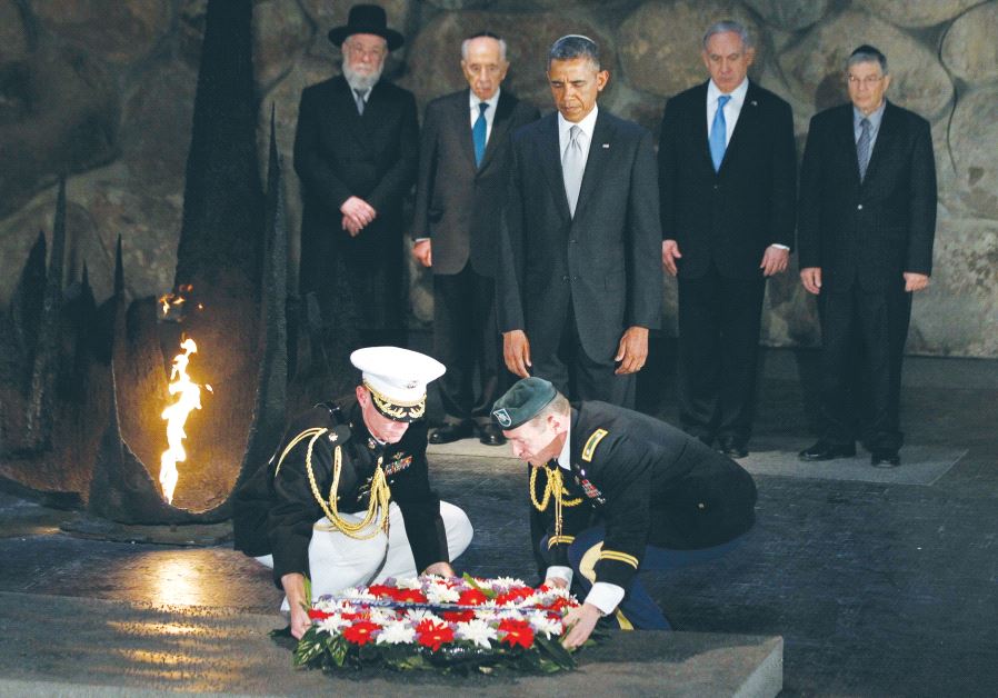 THEN-US PRESIDENT Barack Obama participates in a wreath laying ceremony in the Hall of Remembrance d