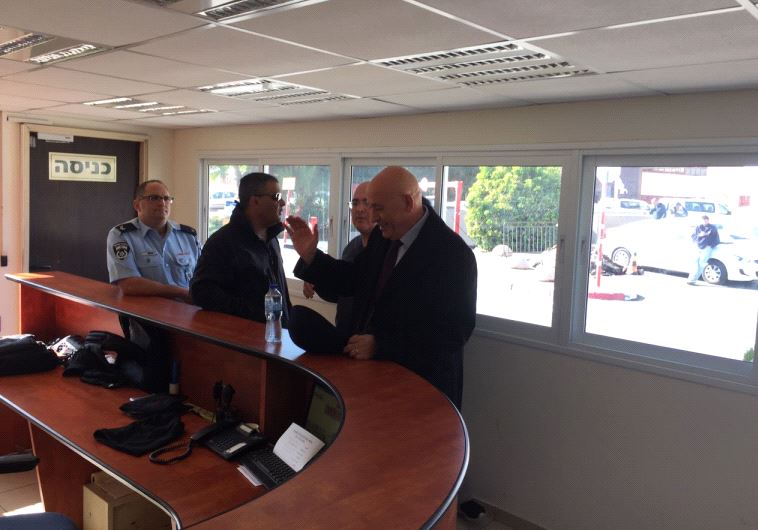 MK Basel Ghattas at a police station for questioning, December 20, 2016. (Credit: Khaled Titi)