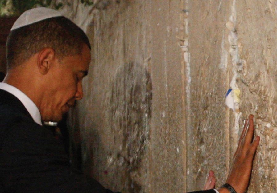 BARACK OBAMA prays at the Western Wall. Credit: Reuters