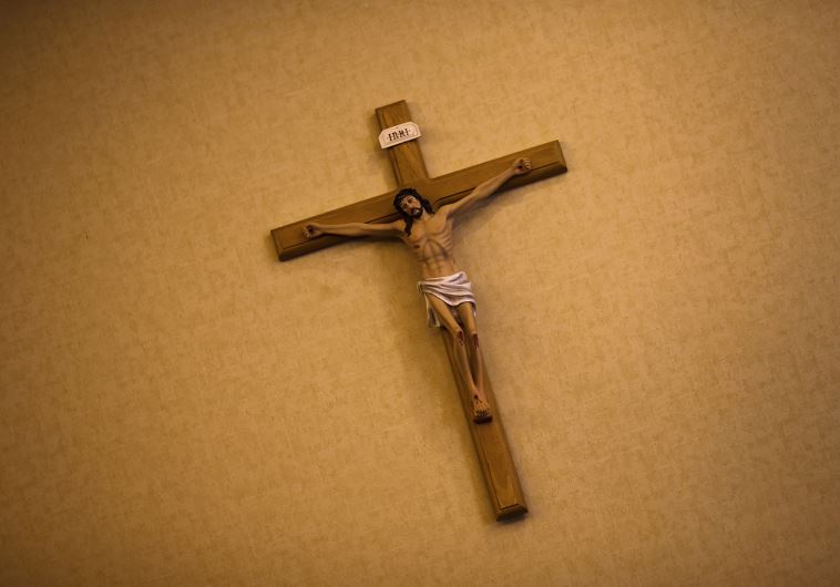 A crucifix is seen on the wall of the Cathedral of the Immaculate Conception in Beijing