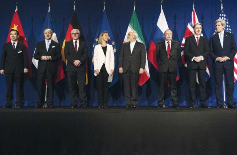 The P5+1 – China, France, Germany, the US, the UK and Russia – prepare to meet with Iranian Foreign Minister Javad Zarif at nuclear talks in Lausanne. (photo credit: REUTERS)