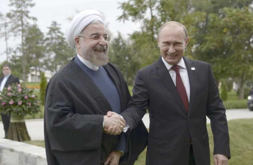 Iranian President Hassan Rouhani and Russian President Vladimir Putin (photo credit: REUTERS)