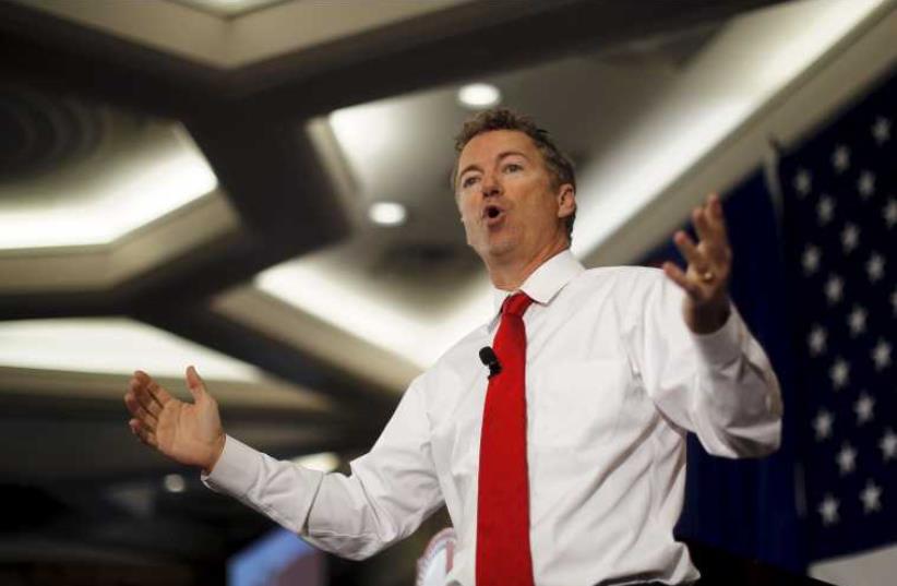 Republican presidential candidate US Senator Rand Paul (R-KY) speaks at the First in the Nation Republican Leadership Conference in New Hampshire April 18 (photo credit: REUTERS)