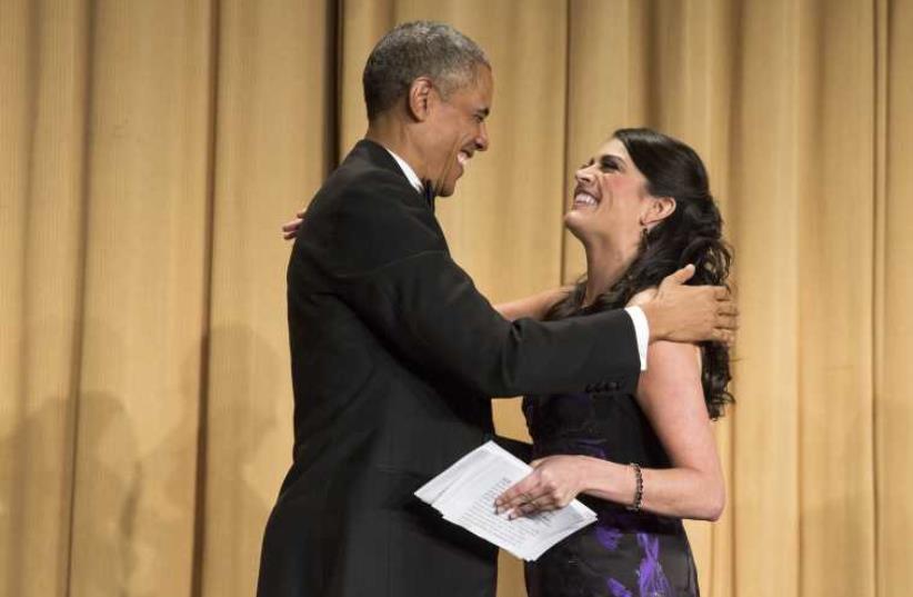 US President Barack Obama greets Saturday Night Live comedian Cecily Strong after her monologue at the 2015 White House Correspondents’ Association Dinner in Washington April 25 (photo credit: REUTERS)