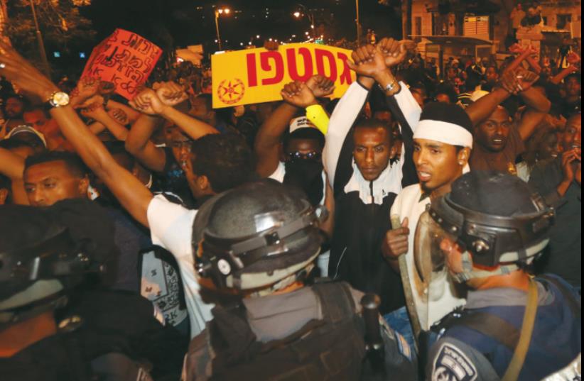 ETHIOPIAN ISRAELIS march in a protest against police brutality and racism in Jerusalem on Thursday. (photo credit: MARC ISRAEL SELLEM/THE JERUSALEM POST)