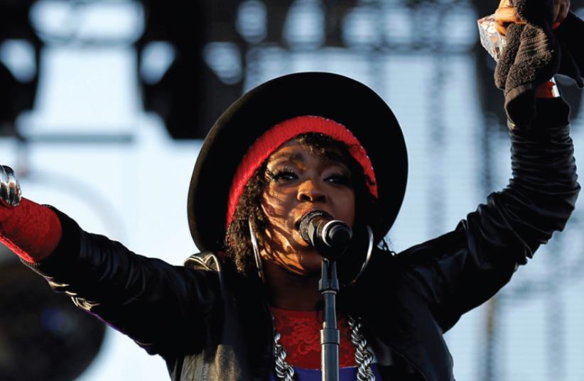 SINGER LAURYN HILL performs at the Coachella Valley Music & Arts Festival California in 2011. BDS activists are pressuring Hill to cancel her upcoming performance in Israel, scheduled for this Thursday. (photo credit: REUTERS)
