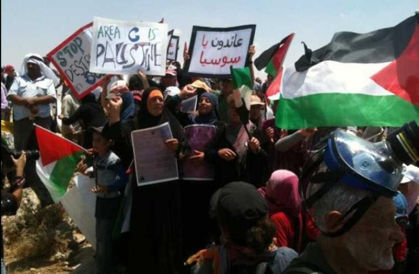 Palestinians demonstrate against the demolition of the village Sussiya by Israel, June 2012 (photo credit: Wikimedia Commons)
